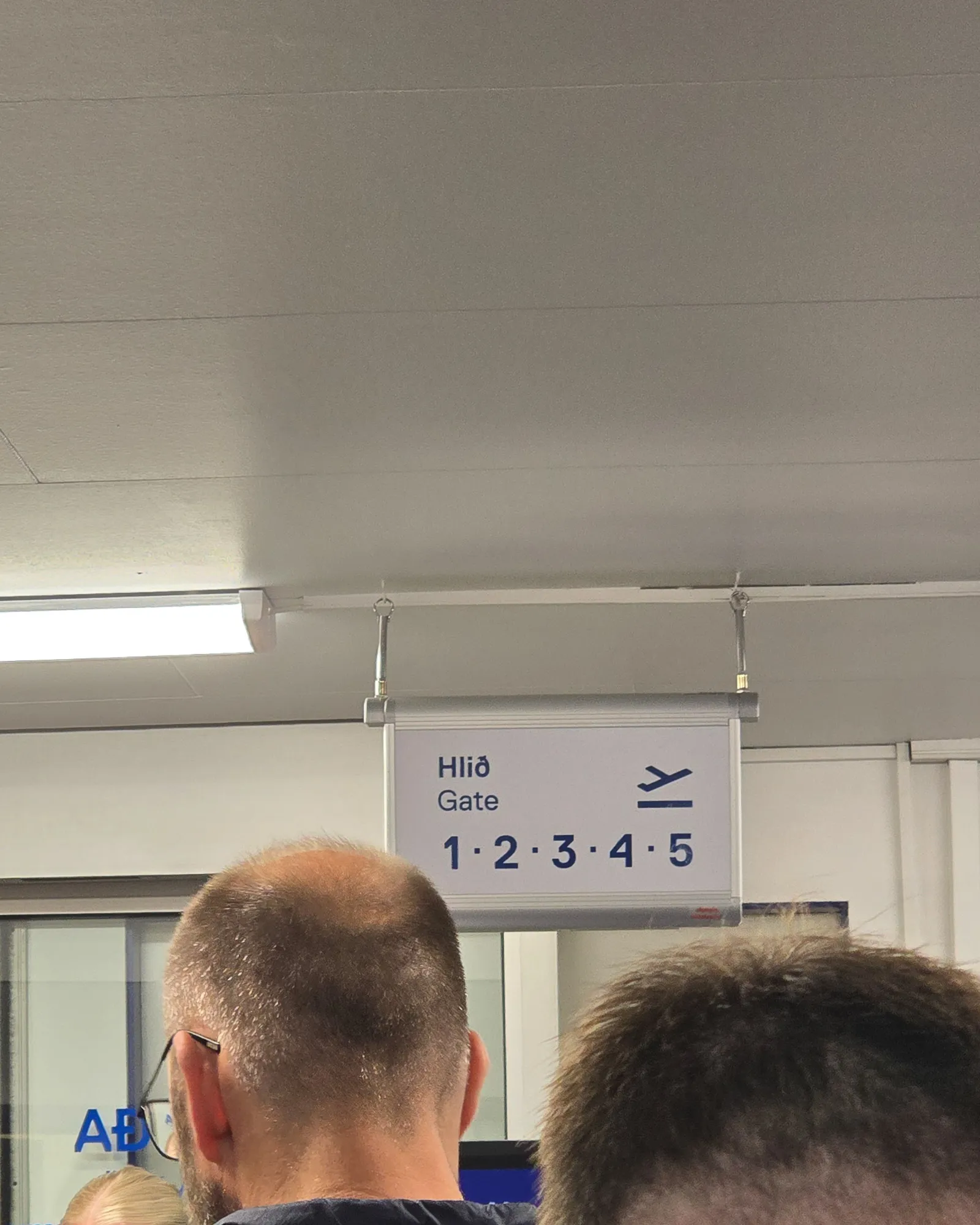 sign above the door with gates 1-5
