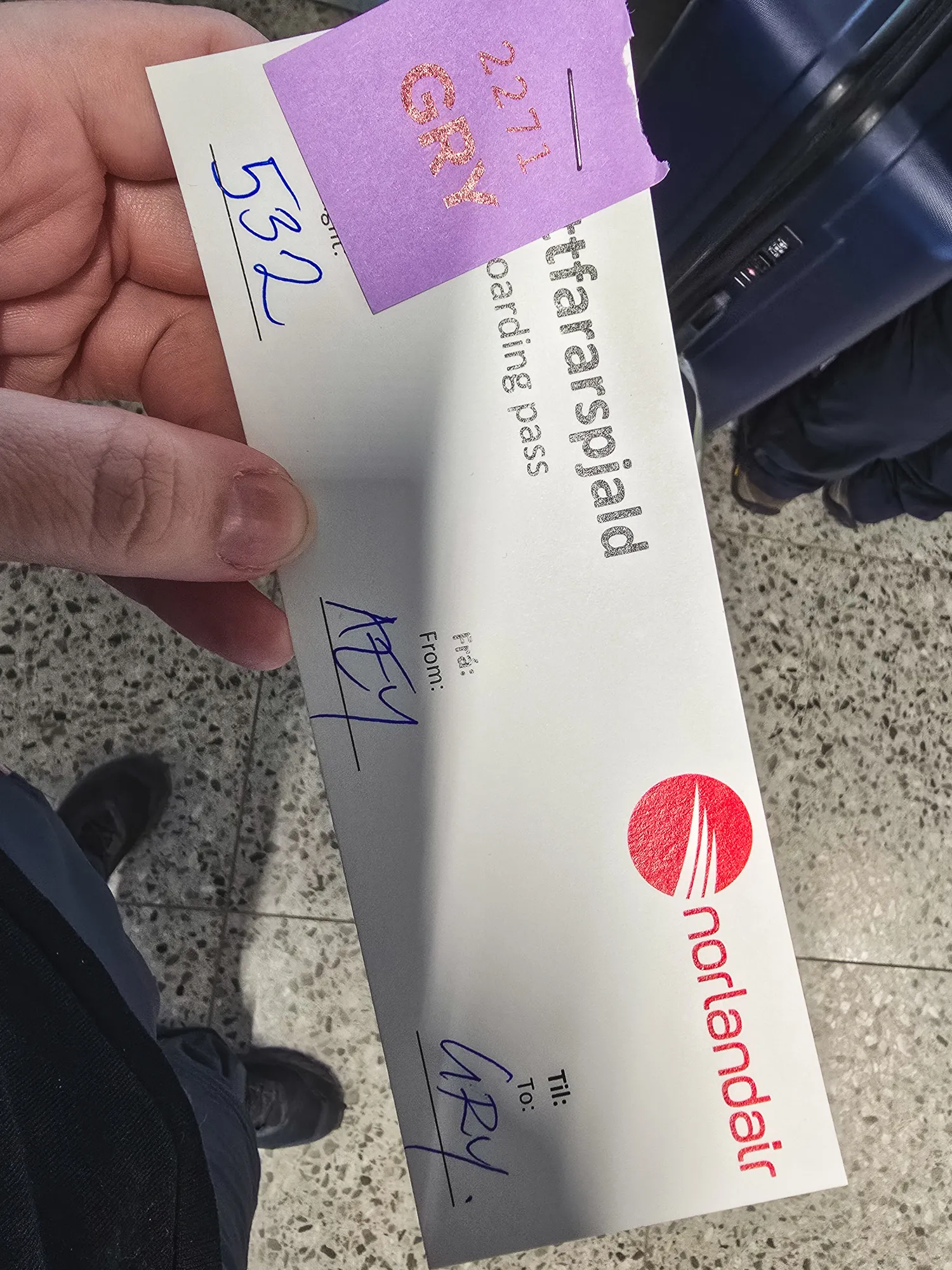 Handwritten boarding pass for the flight to Grímsey