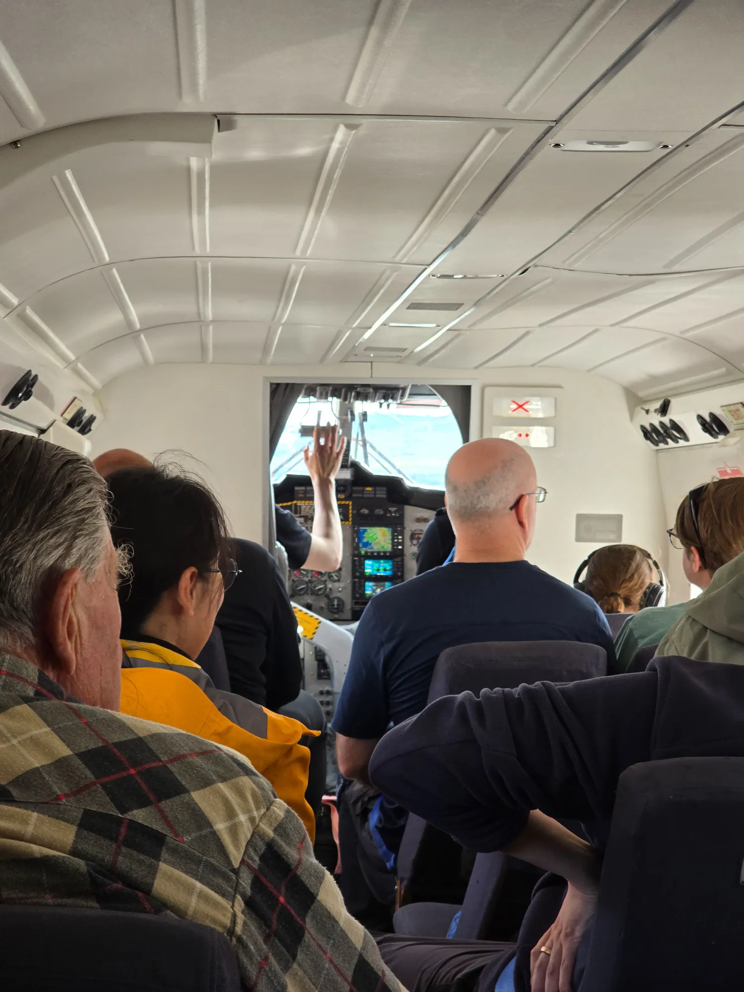 pilot's hand moving the lever up for takeoff