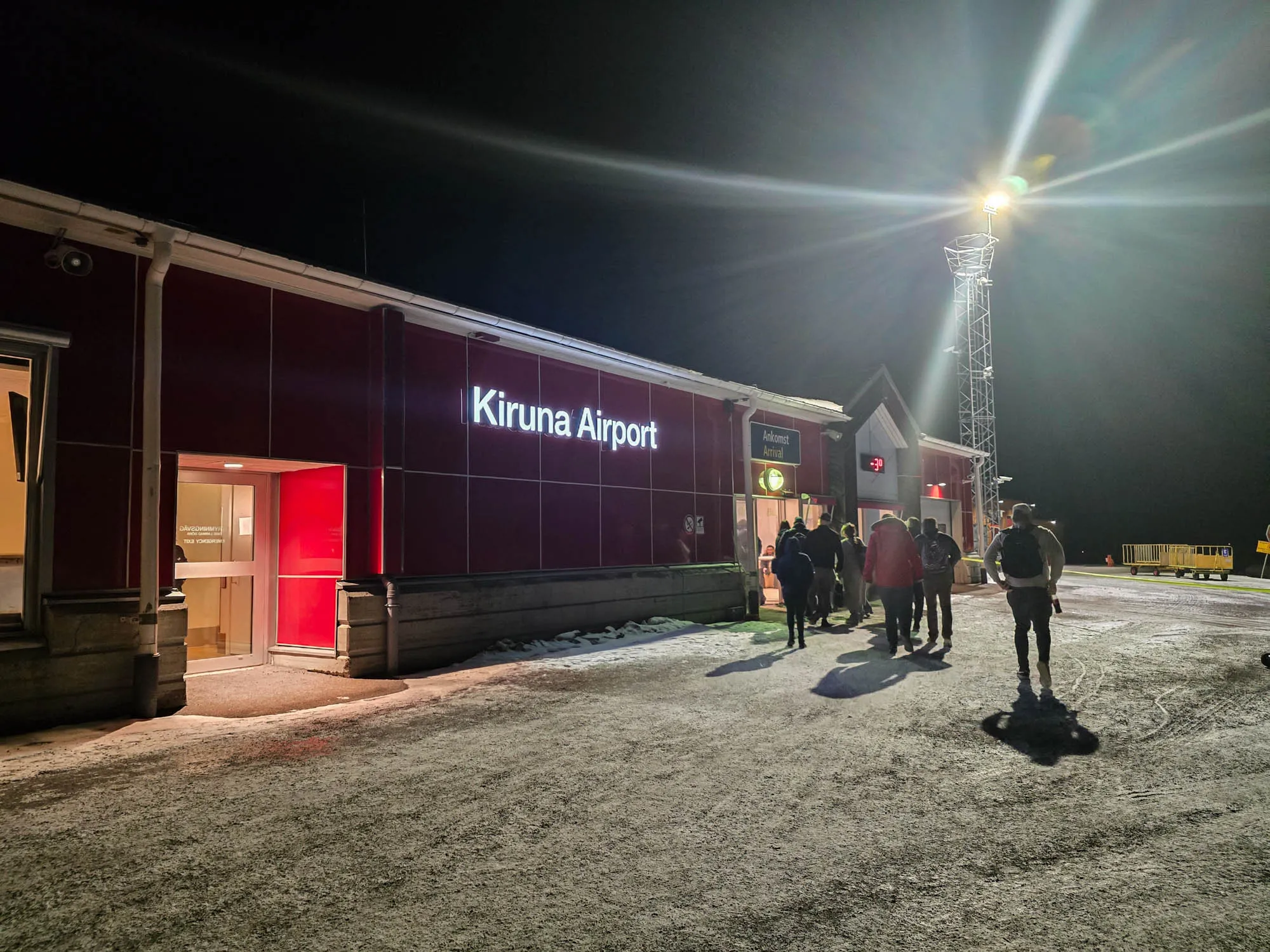 photo of kiruna airport arrival at night time